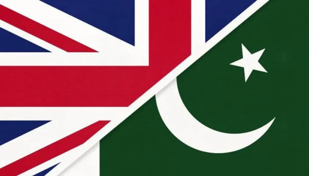 British High Commissioner Jane Marriott and Federal Minister Ahad Cheema discussing economic reforms in Islamabad.