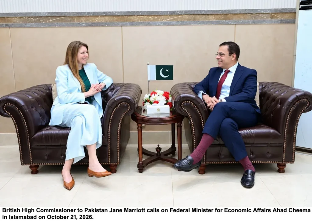 British High Commissioner Jane Marriott and Federal Minister Ahad Cheema discussing economic reforms in Islamabad.