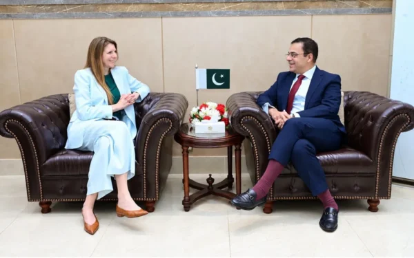 British High Commissioner Jane Marriott and Federal Minister Ahad Cheema discussing economic reforms in Islamabad.