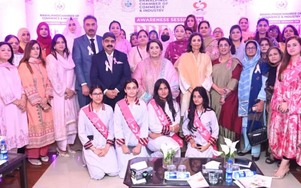 Attendees and speakers gather for the breast cancer awareness seminar hosted by the Rawalpindi Chamber of Commerce and Industry. (Image 1)